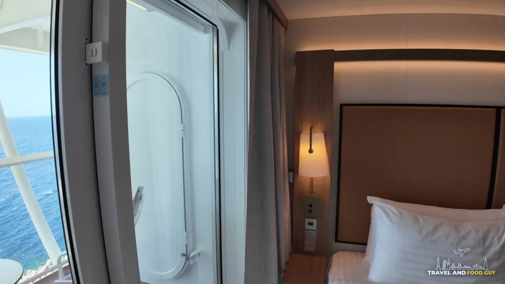 Blackout curtains beside the balcony door in stateroom 14632