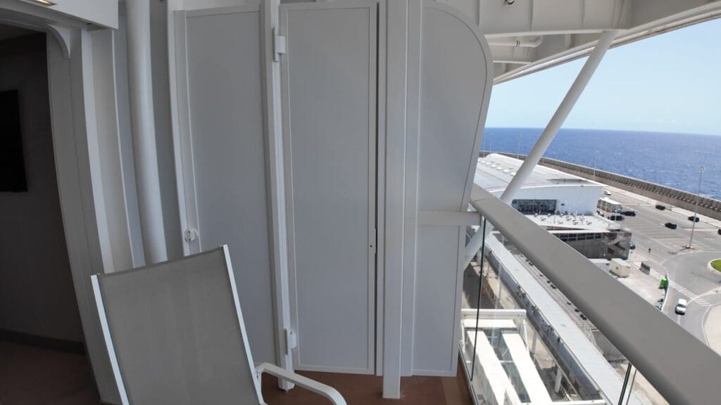 The panelled divider between two adjacent balconies on Legend of the Seas