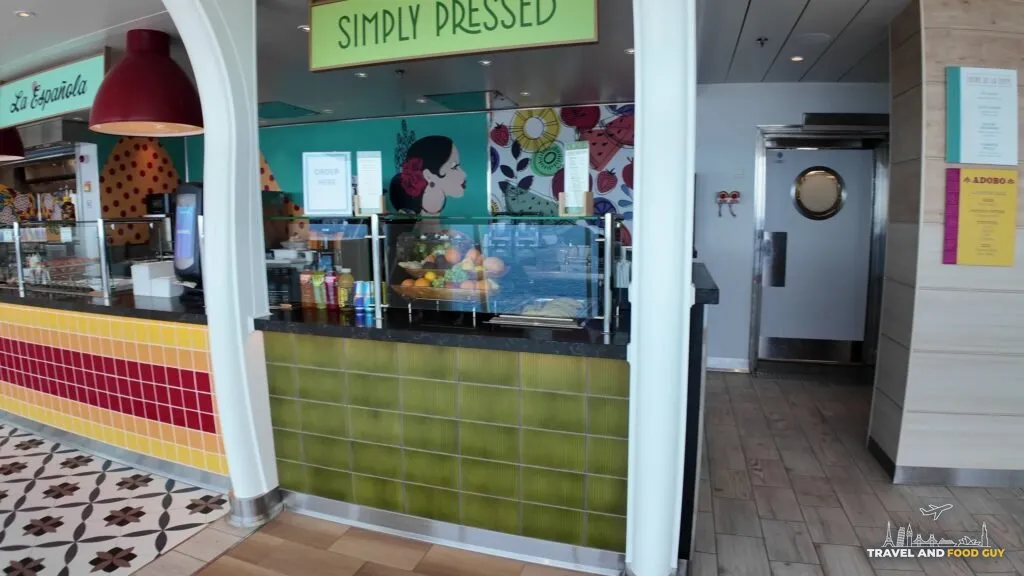 The AquaDome Market counter on Legend of the Seas, with the Simply Pressed juice bar and La Espanola stands, empty on embarkation day.