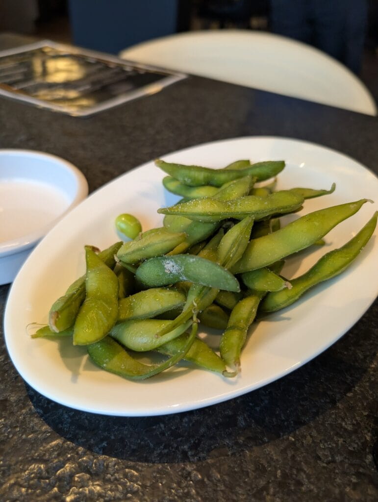 Salted edamame, sent out free by the kitchen and not on our receipt.