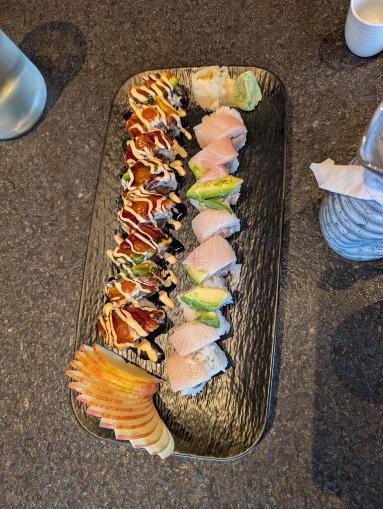 Both rolls plated together with fanned apple, ginger and wasabi.