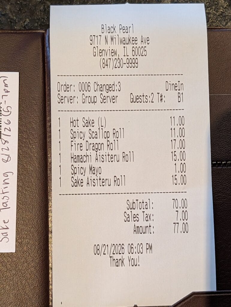 The receipt for dinner for two on opening night, seventy seven dollars including tax.