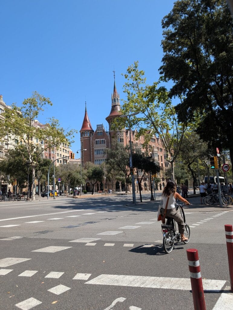 Casa de les Punxes seen across an Eixample crossing from the tuk tuk