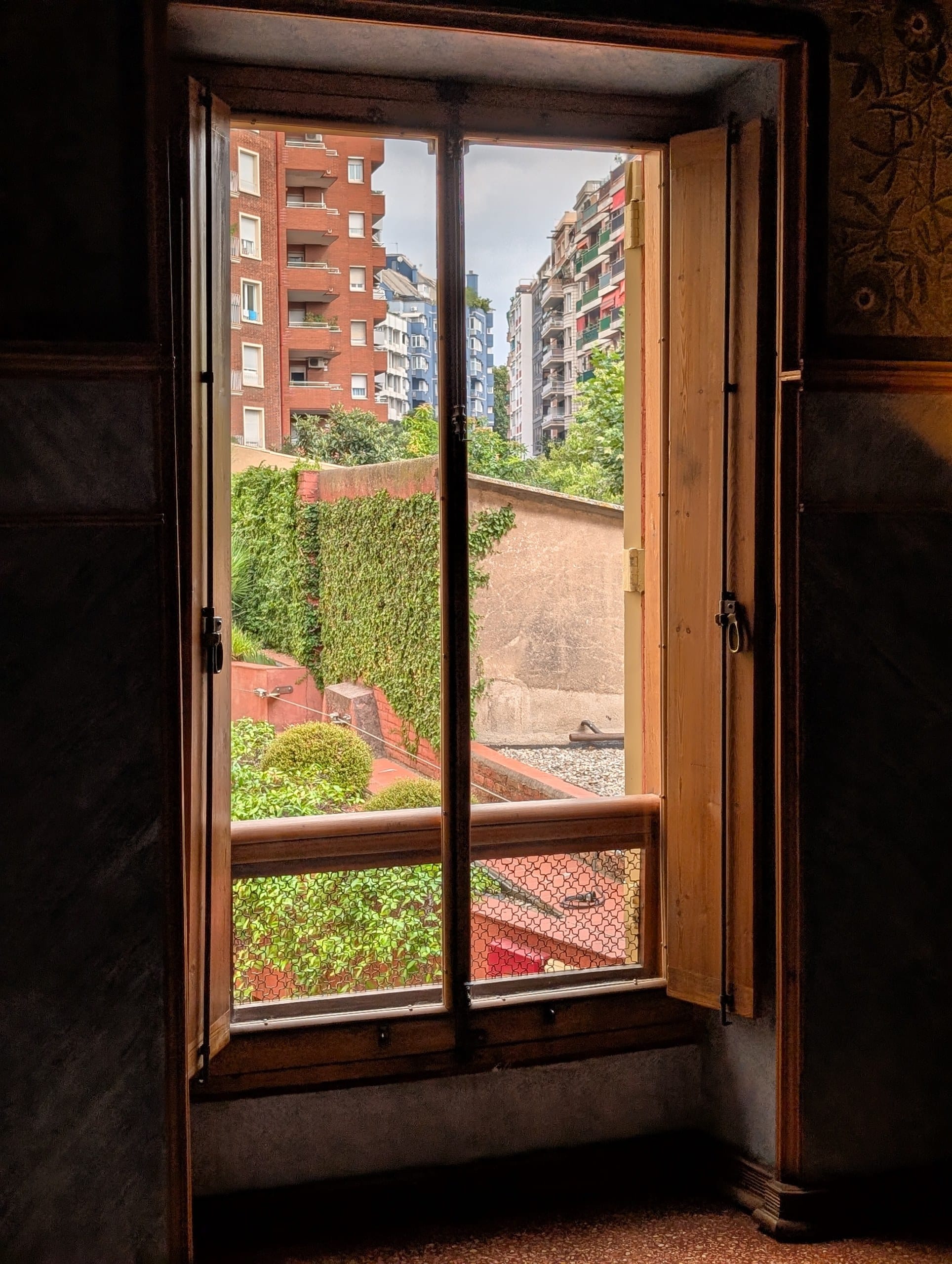 Shuttered window at Casa Vicens looking down over the garden