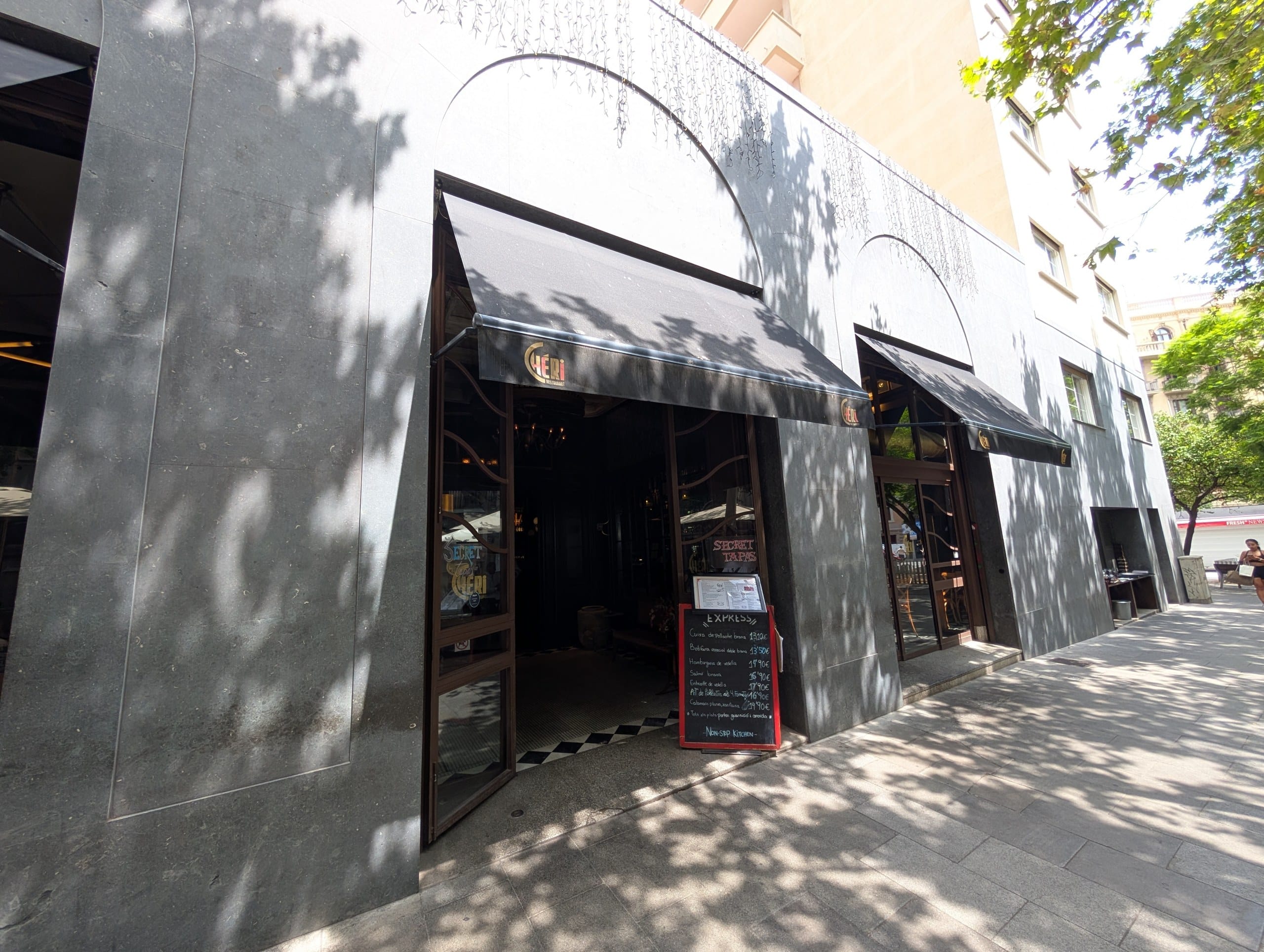 The Cheri restaurant frontage on Carrer d'Enric Granados 122 in Barcelona