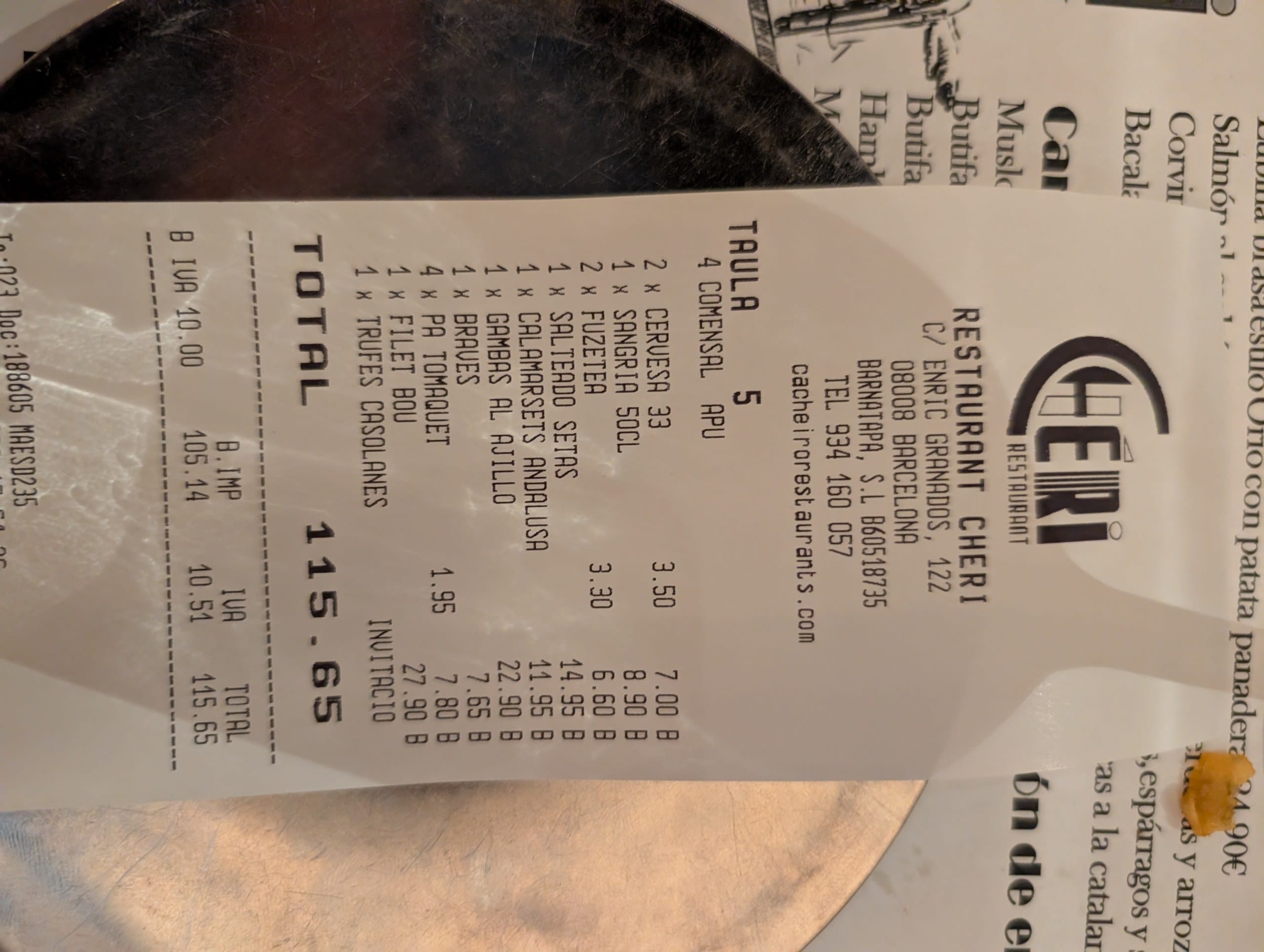 The Cheri Barcelona receipt, four covers and a total of 115,65 euros including drinks