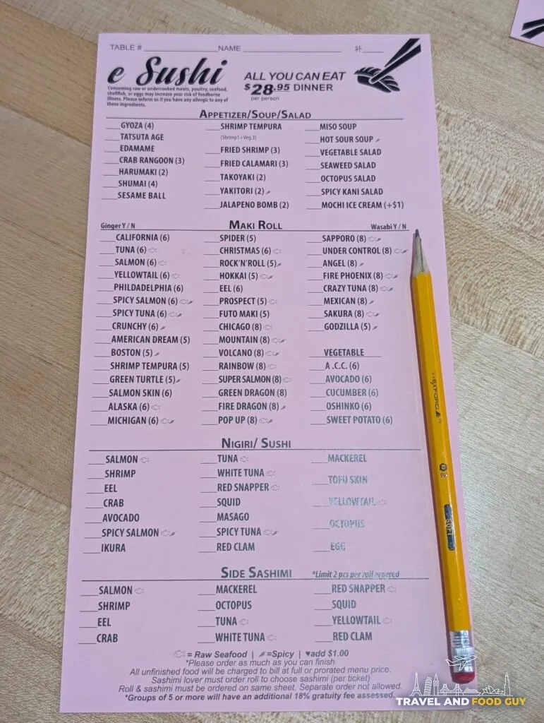 The pink all you can eat order sheet at e Sushi, priced at 28.95 dollars per person for dinner. You tick what you want in pencil and hand it over, round after round.