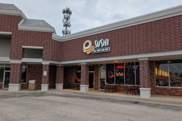 The e Sushi storefront on West Golf Road in Mount Prospect, Illinois, with the illuminated ALL YOU CAN EAT sign above the entrance.