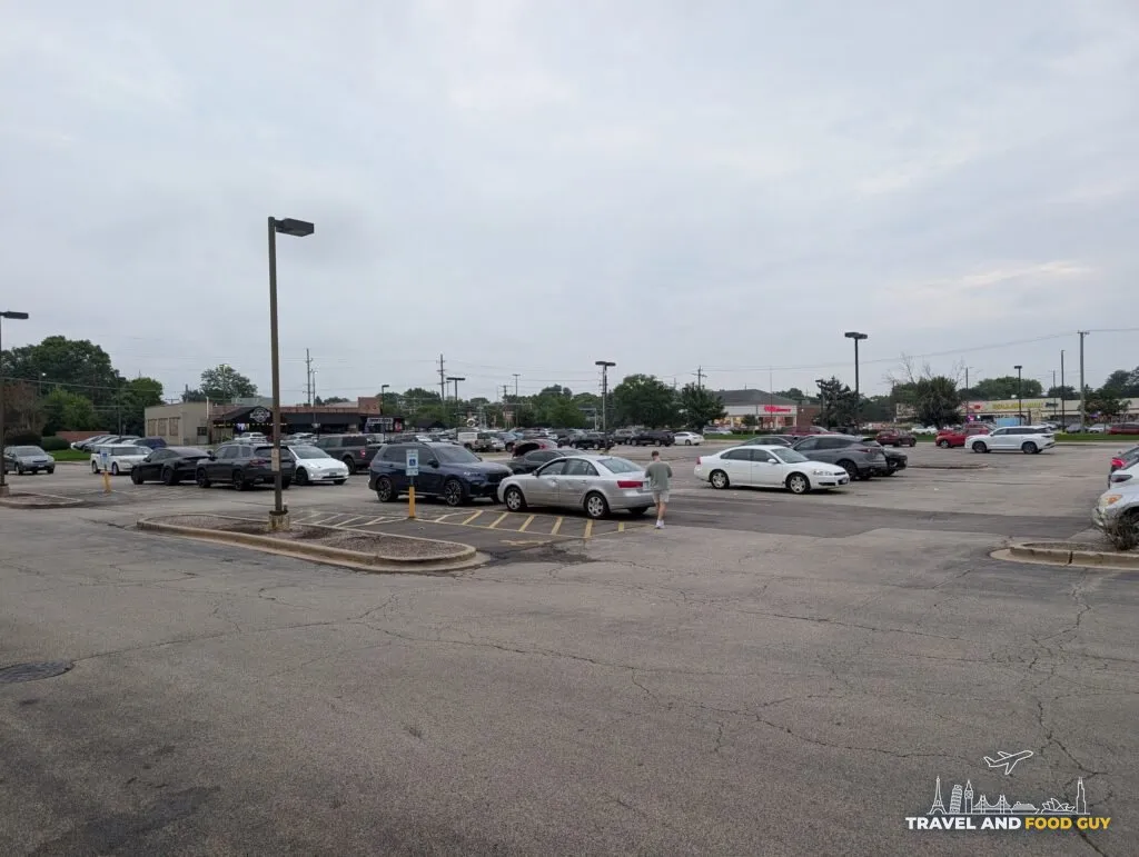 The strip mall parking lot on West Golf Road that e Sushi shares with a Walgreens and other Mount Prospect storefronts.