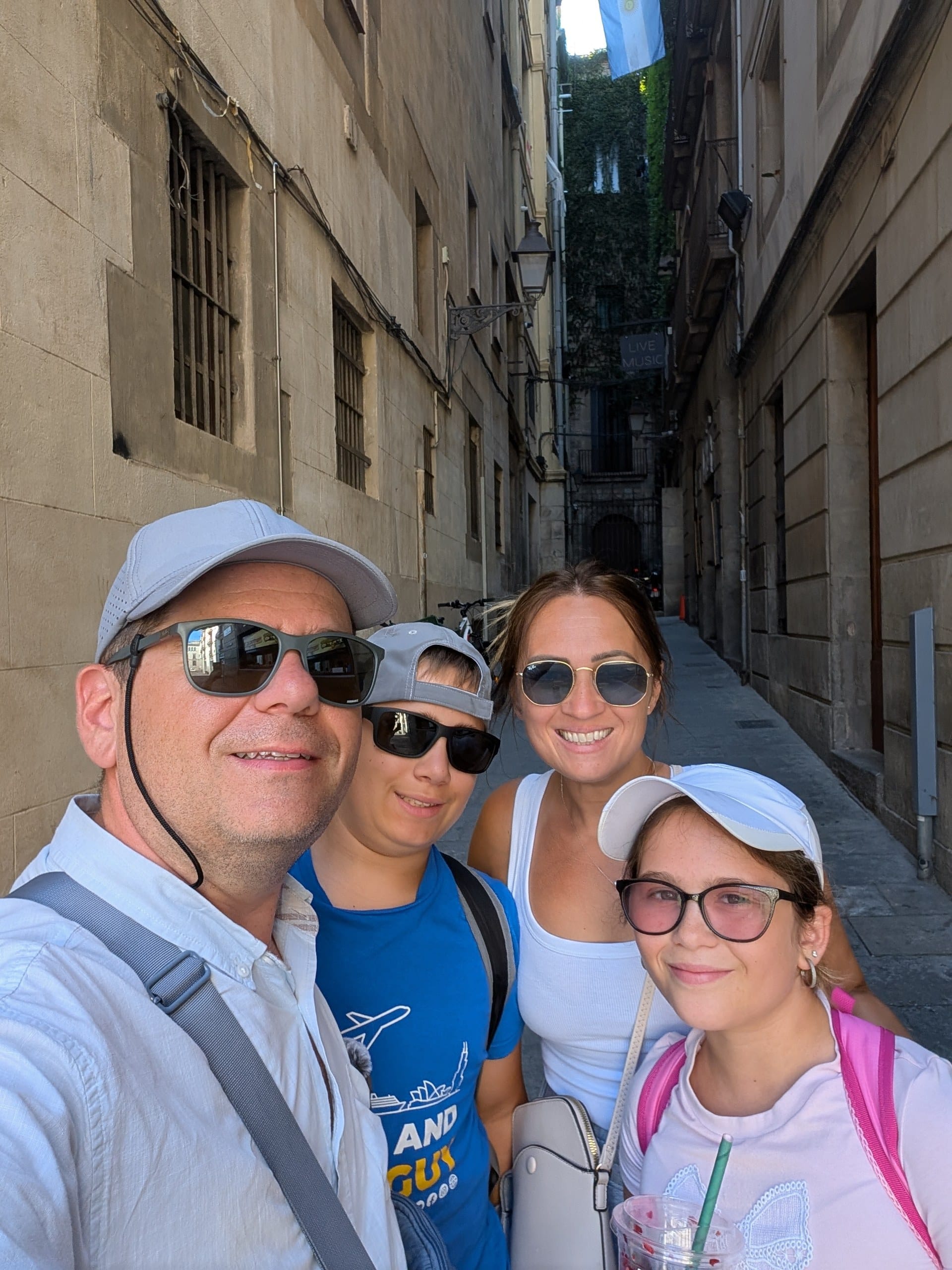 Alex, Vika, Josh and Emily in a narrow lane in the Gothic Quarter of Barcelona
