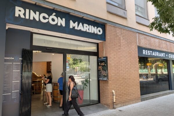 The Rincon Marino sign and storefront on Carrer de la Selva de Mar in the Poblenou neighborhood of Barcelona.