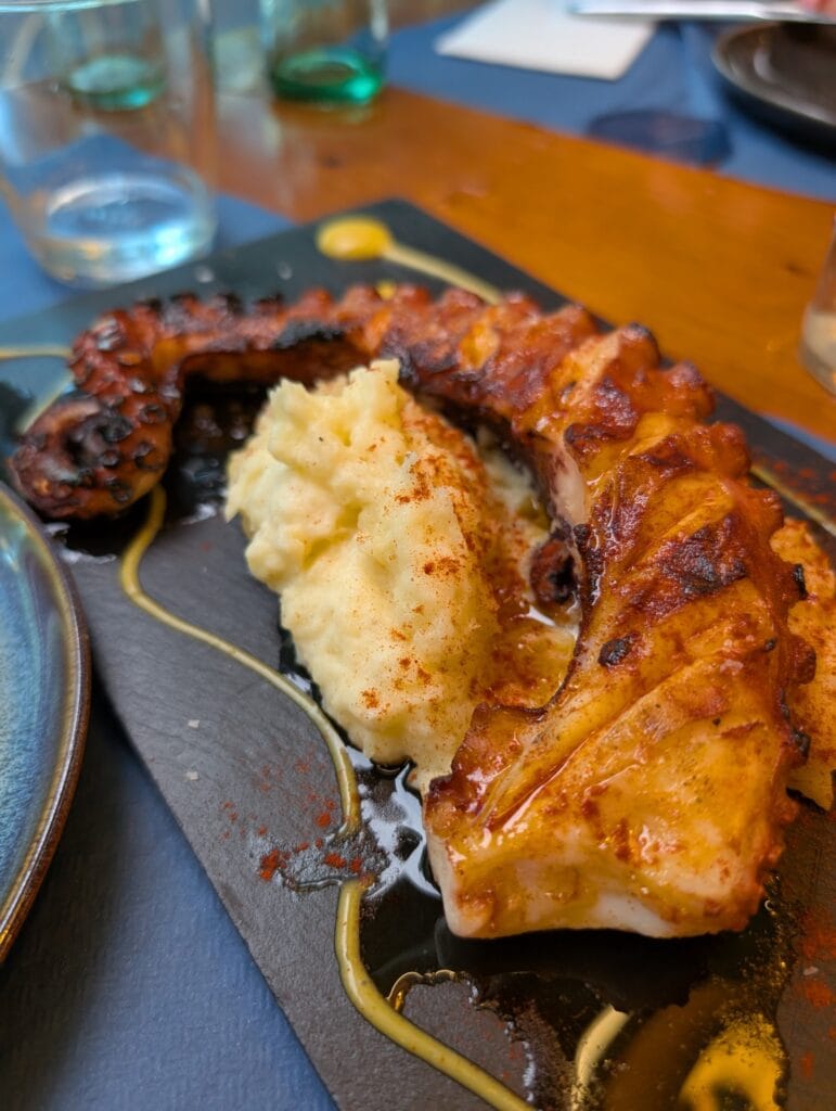 Grilled octopus over potato purée at Rincón Marino