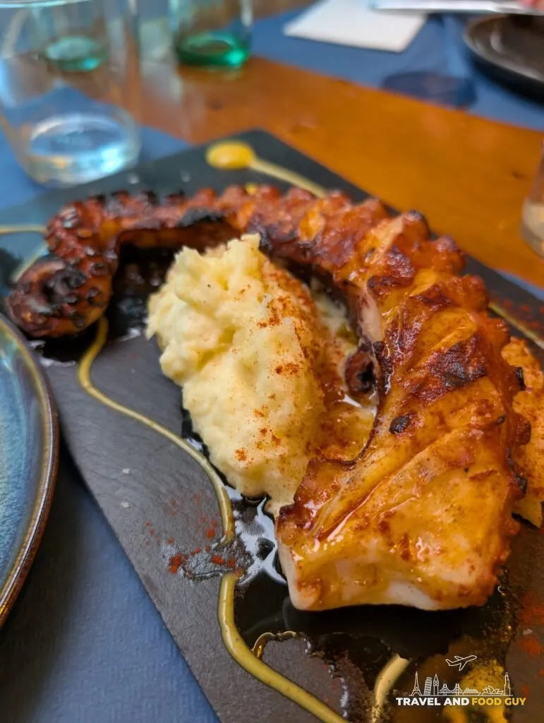 Grilled octopus over potato purée at Rincón Marino