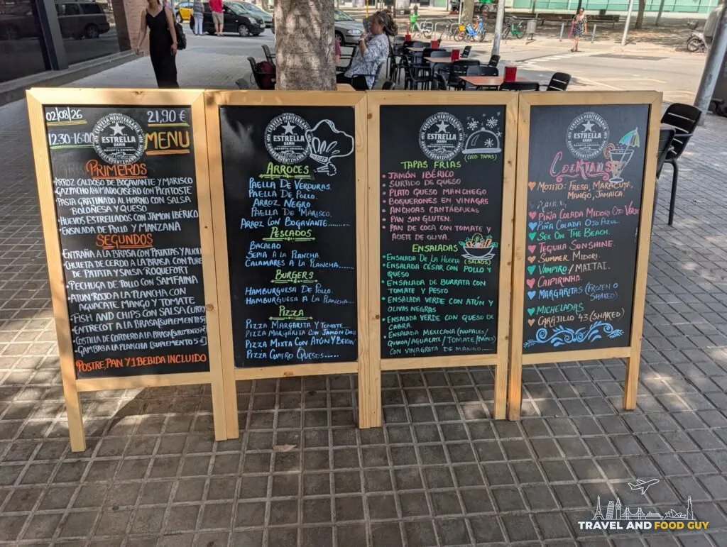 Chalkboard menu boards outside Rincón Marino showing the menú del día at 21.90 euros from 12:30 to 16:00