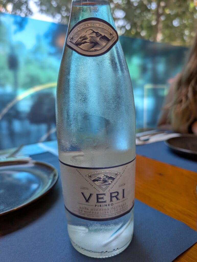 A bottle of still water on the table at Rincón Marino