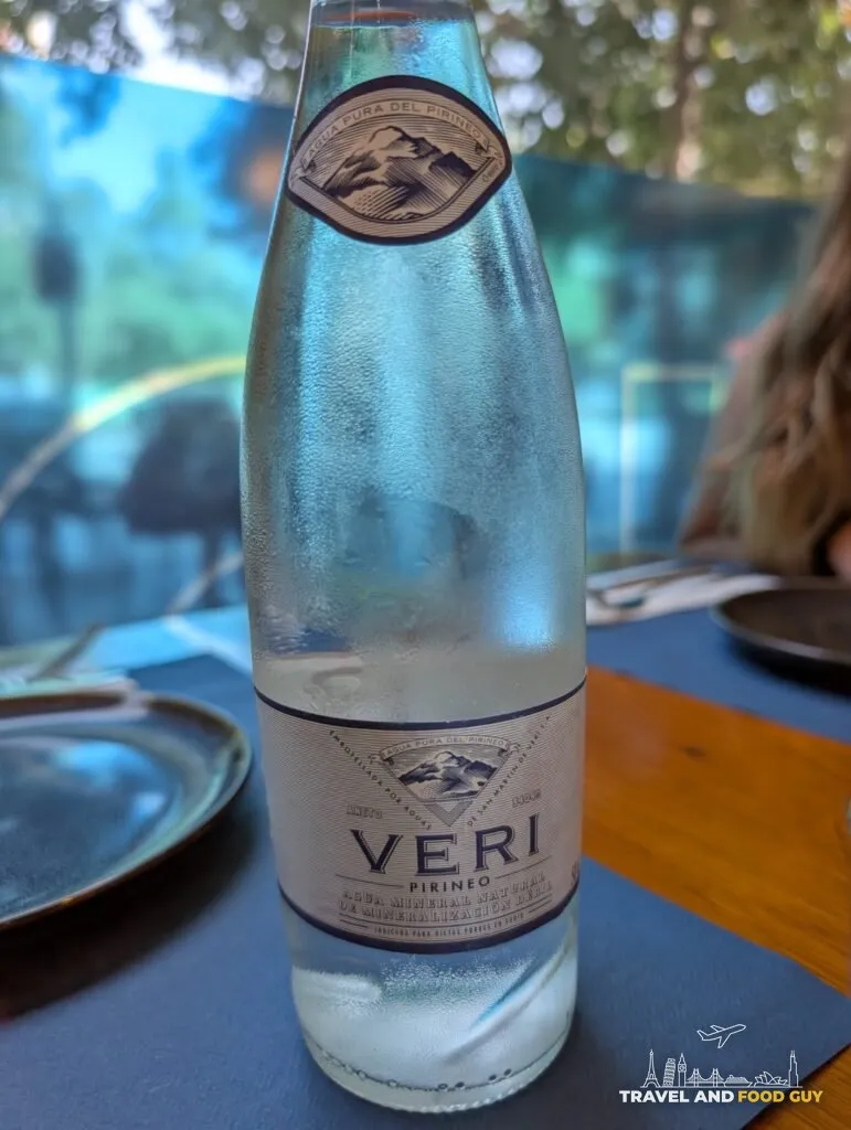 A bottle of still water on the table at Rincón Marino
