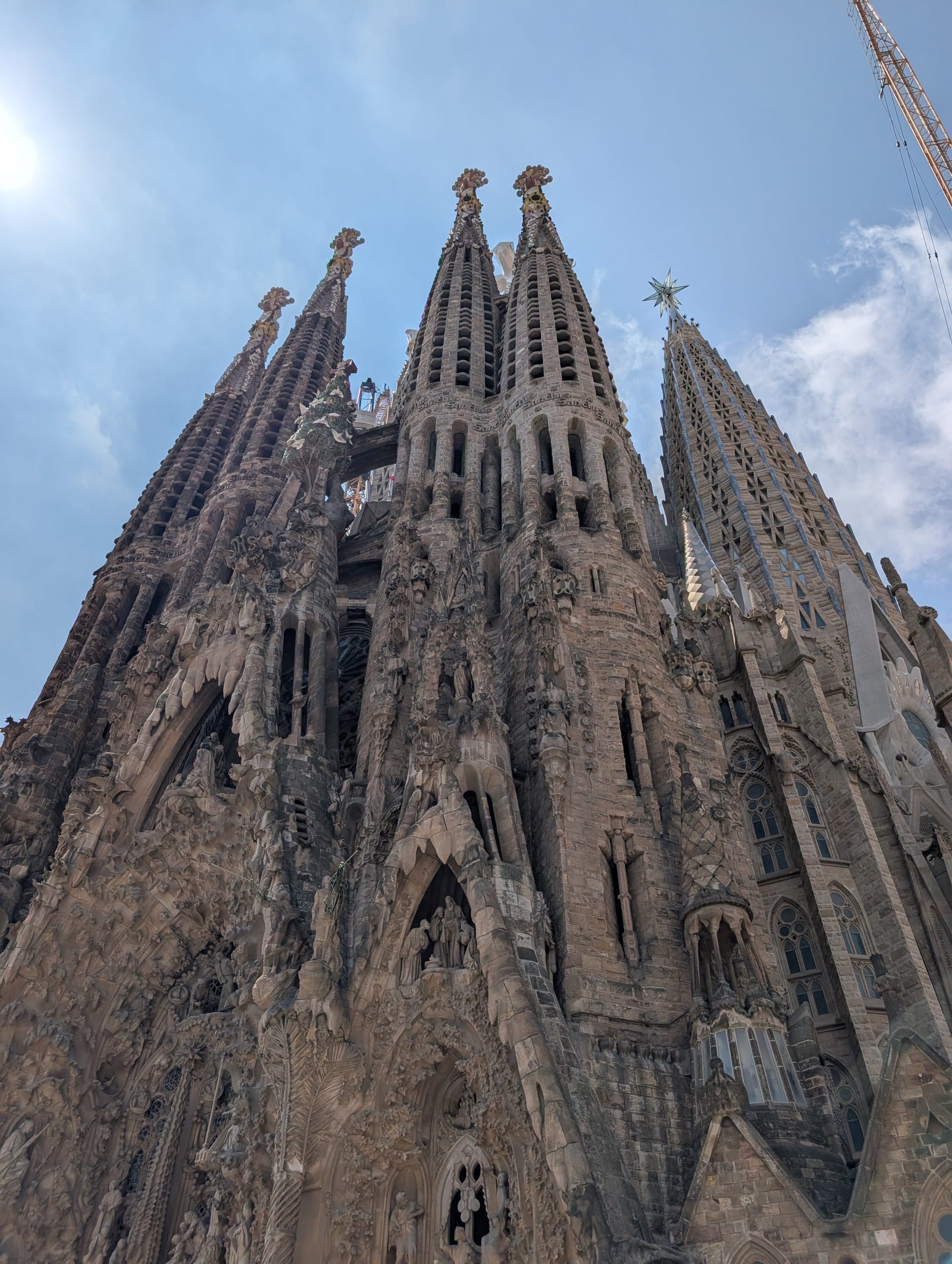 The Sagrada Familia spires rising above the facade in Barcelona