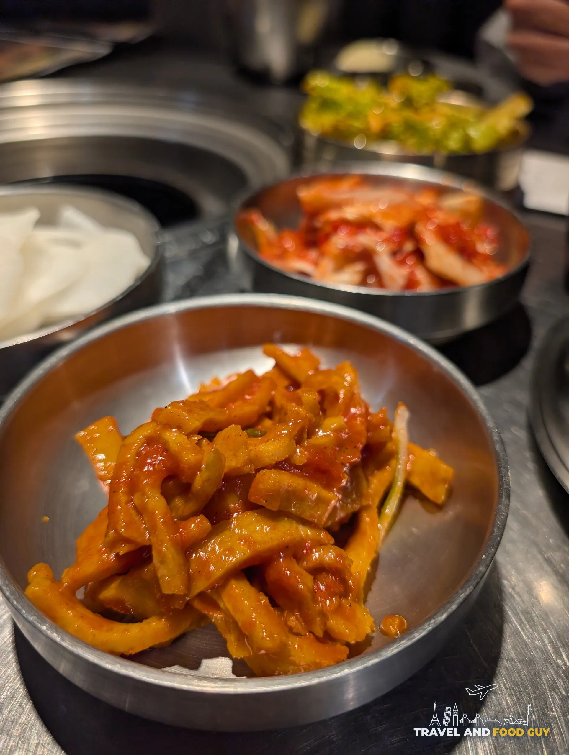 Banchan at Tanjong Hwaro, spicy pickled radish and kimchi