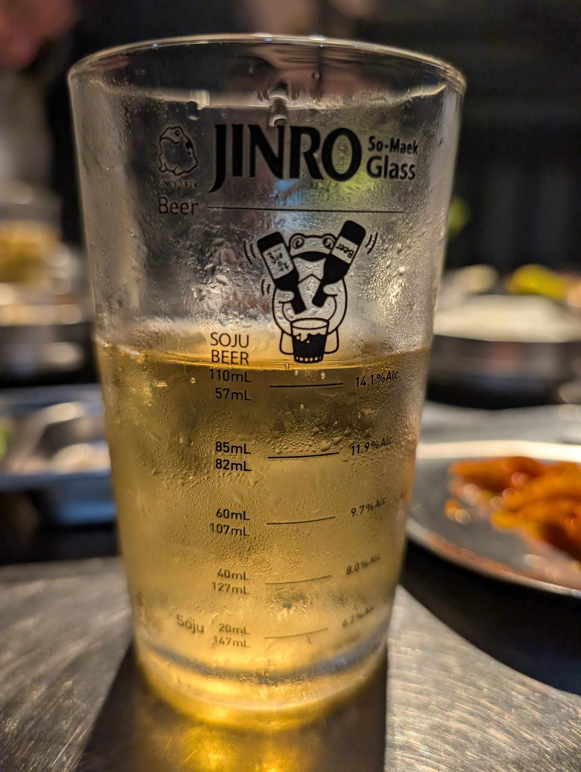 Jinro So-Maek measuring glass mixing soju and beer at Tanjong Hwaro