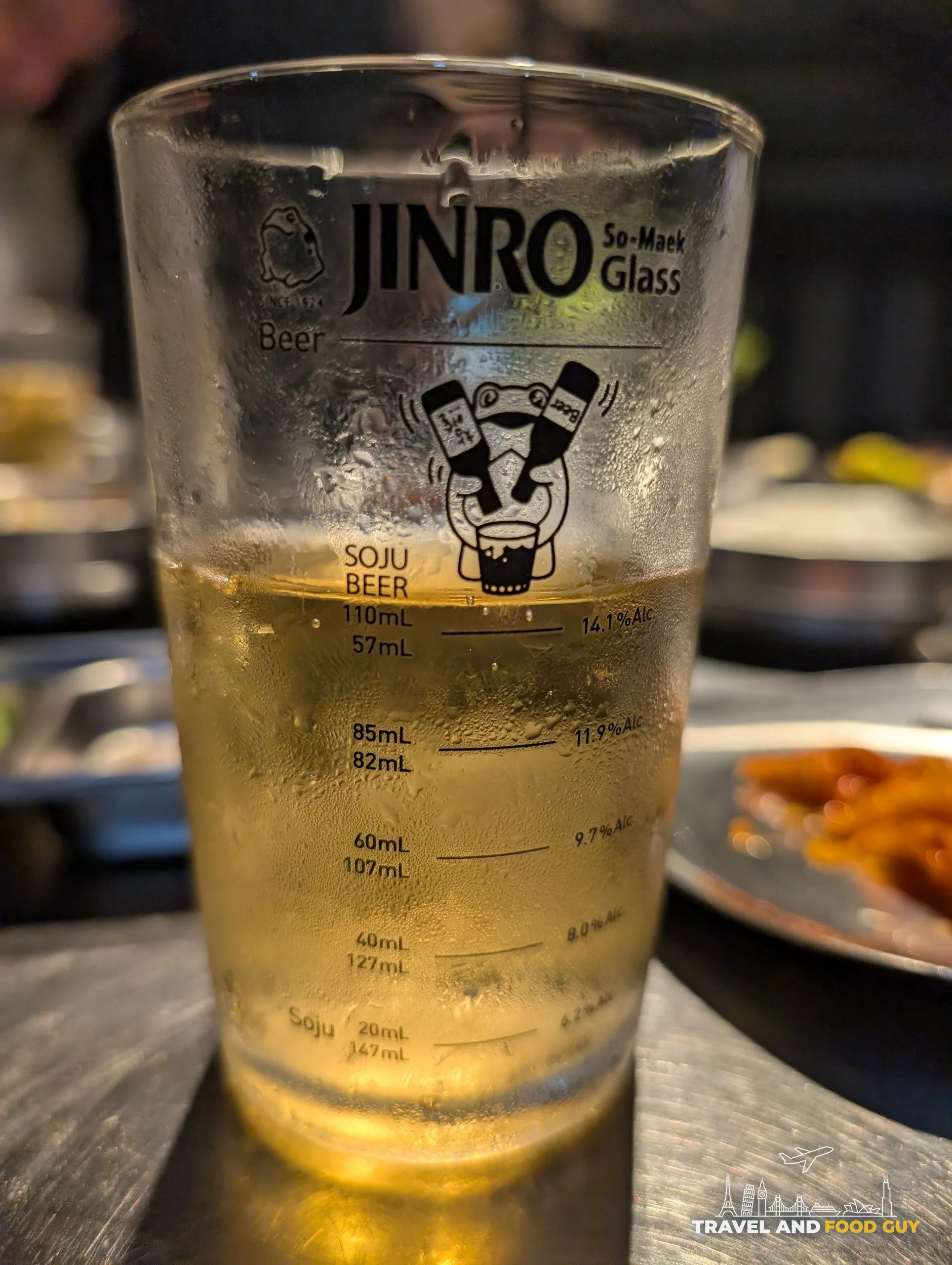 Jinro So-Maek measuring glass mixing soju and beer at Tanjong Hwaro