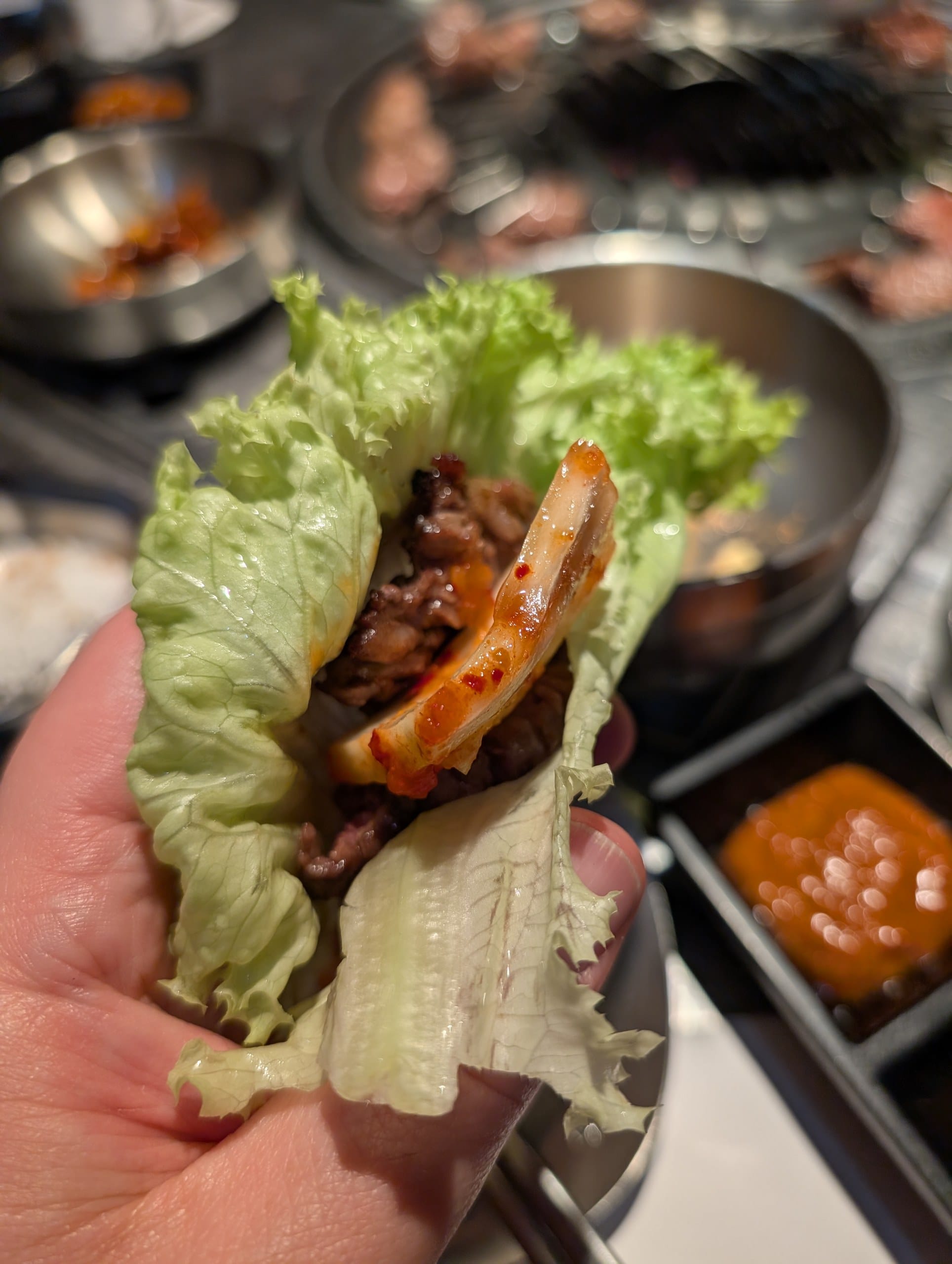 Ssam wrap with grilled pork and kimchi at Tanjong Hwaro