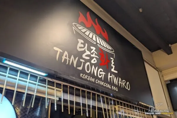 Tanjong Hwaro storefront sign at night on Tanjong Pagar Road