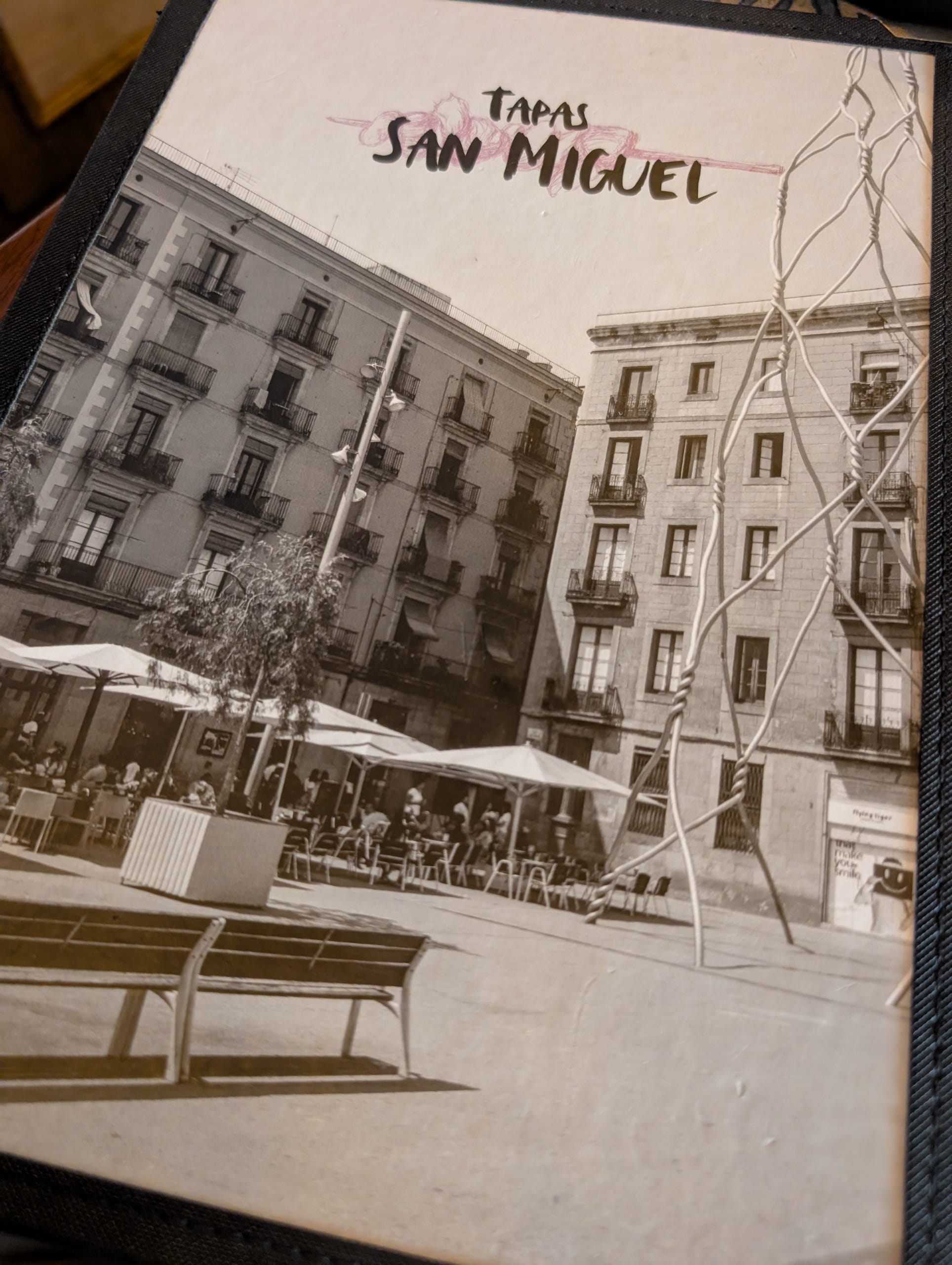 The menu at Tapas San Miguel in Barcelona open on the table