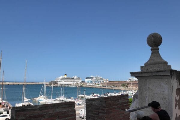 View from Forte Michelangelo over the Civitavecchia yacht marina to two cruise ships at the pier