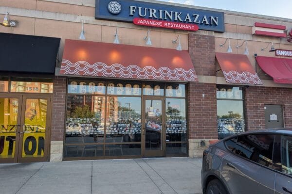 The Furinkazan Japanese Restaurant sign and red wave awnings at 1512 Market Street in Des Plaines.