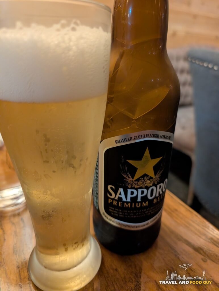 A large Sapporo poured into a tall glass at Kaido.