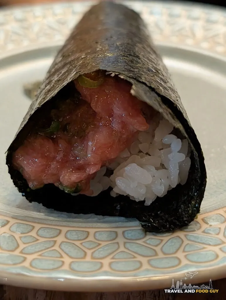 Kaido's negi toro hand roll, fatty tuna and scallion in crisp nori.