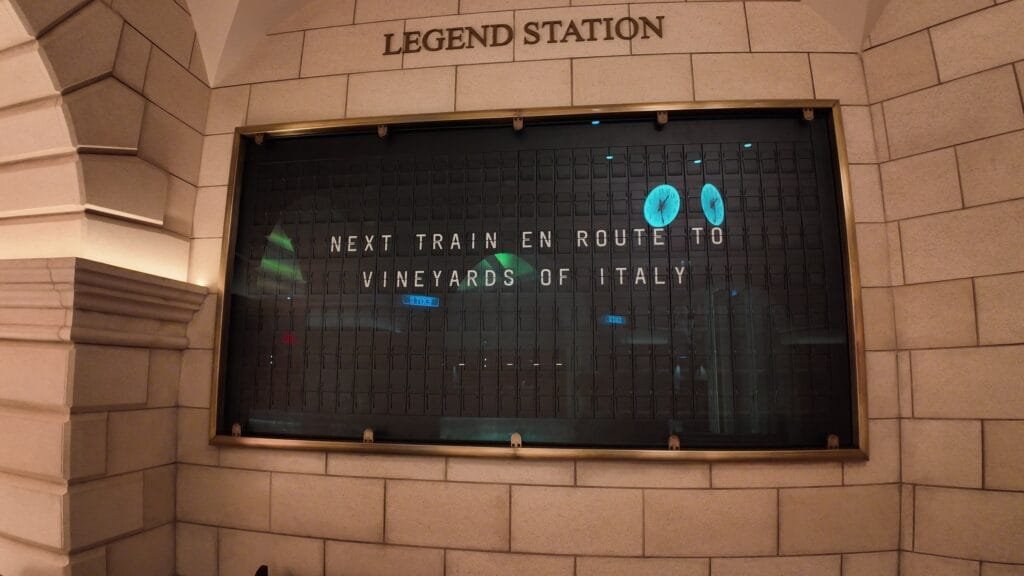 The departure board at Royal Railway, Legend Station on Legend of the Seas