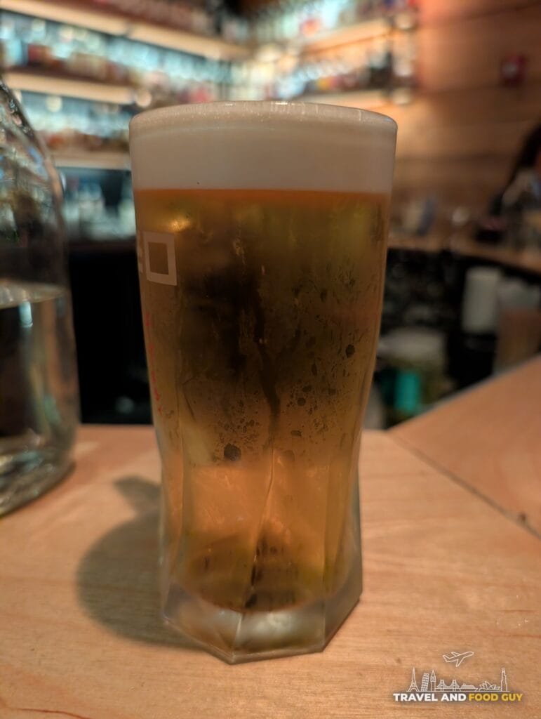 An ice cold Asahi draft on the bar at Sushi-San.