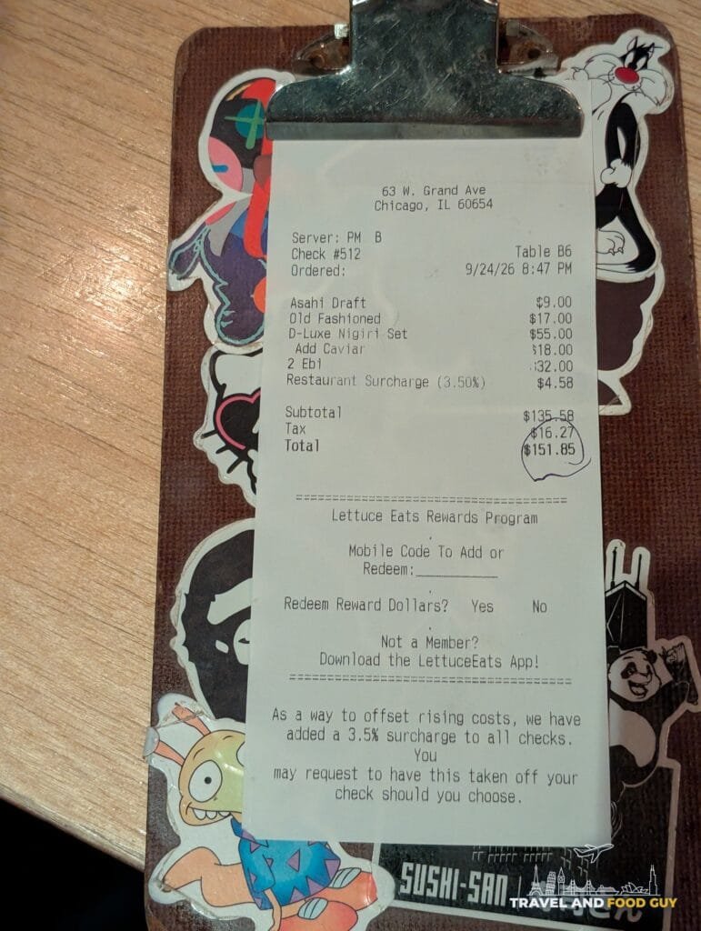 The itemized Sushi-San receipt for dinner for two, $151.85 total including a 3.5% surcharge.