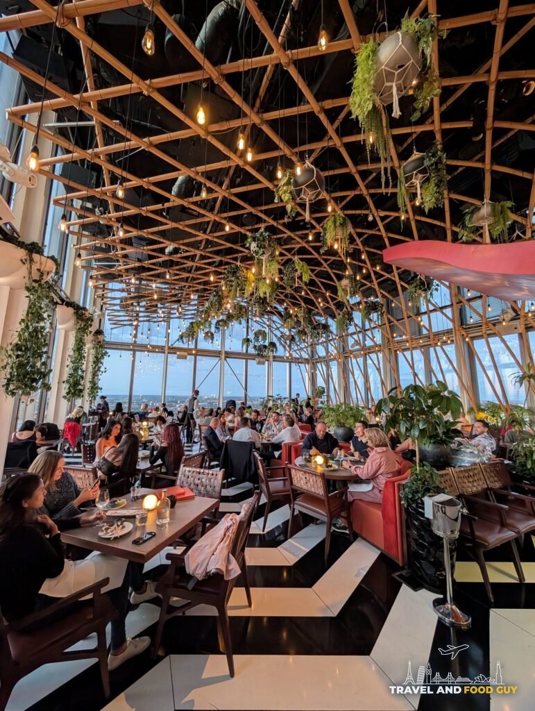SUSHISAMBA London's main dining room full of diners on a Tuesday evening.