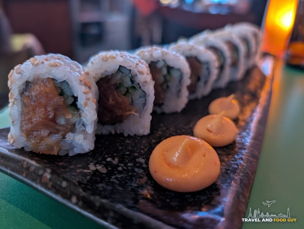 A spicy tuna roll at SUSHISAMBA London with dots of spicy mayo.