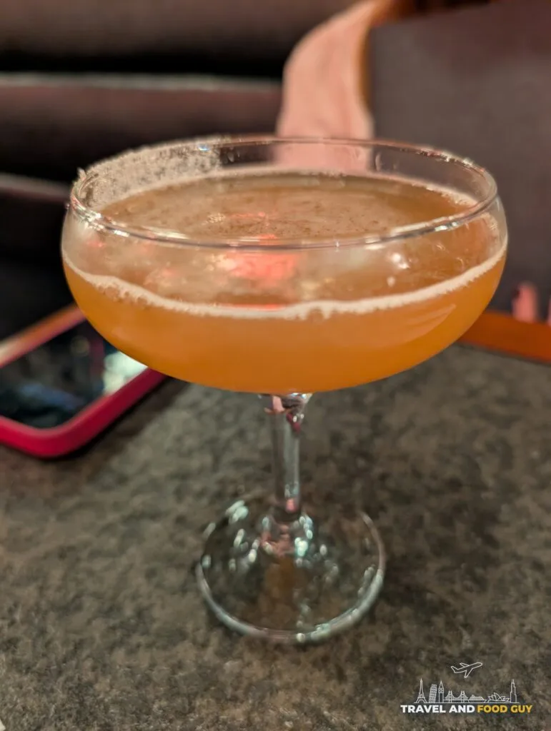 A Sidecar cocktail in a coupe glass with a sugared rim at Wu's House Kildeer.