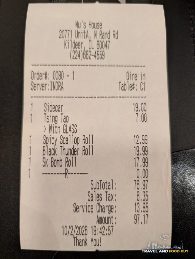 The Wu's House Kildeer receipt for a Sidecar, a Tsingtao and three rolls, $97.17 total including a $13.85 service charge.